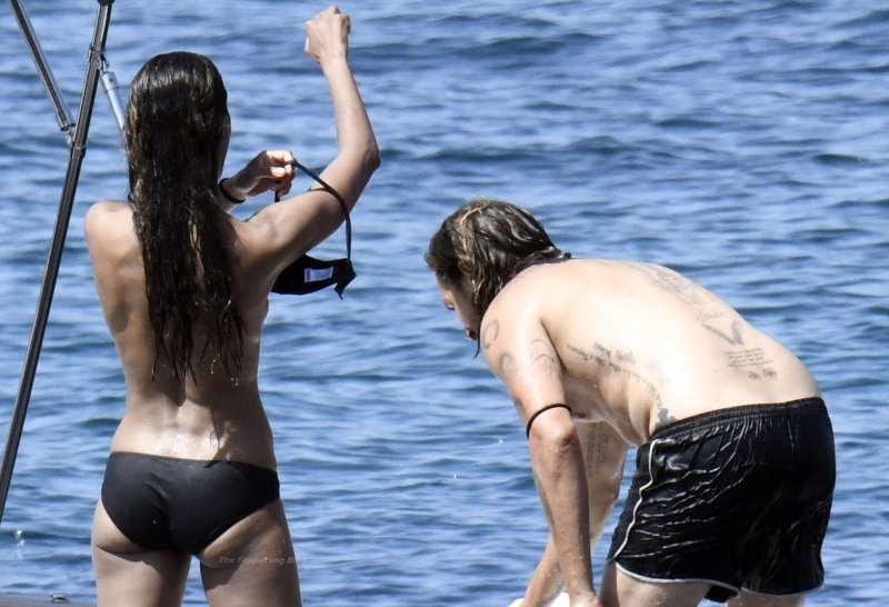 Zoe Saldana leaking on a topless yacht